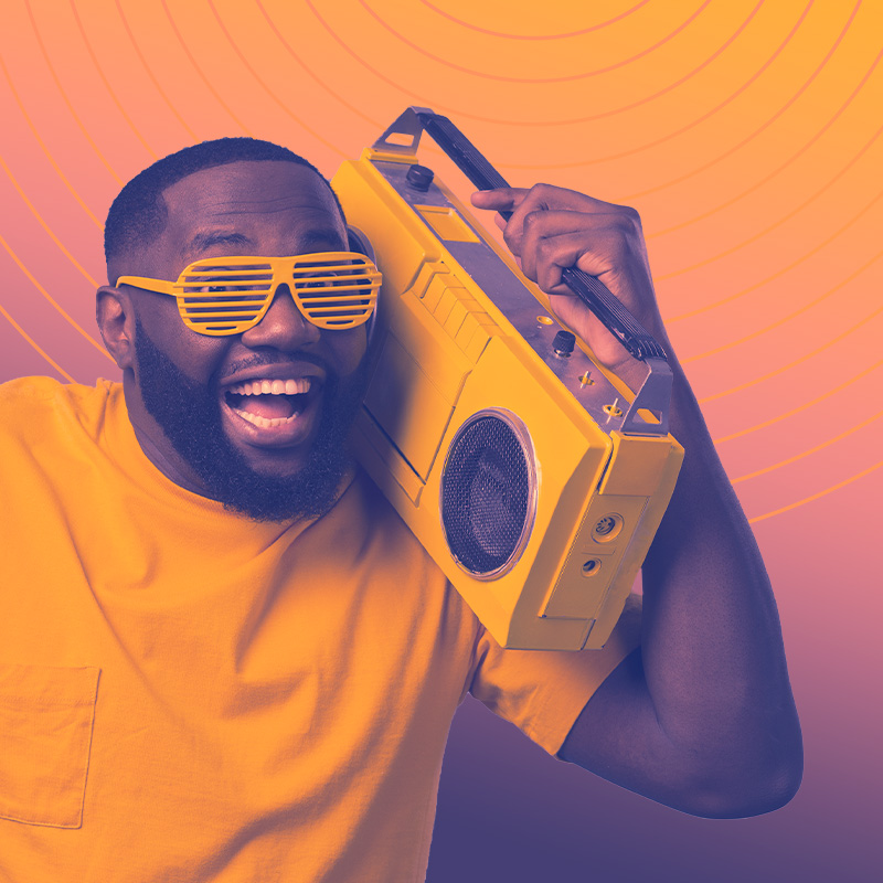 man smiling using a radio